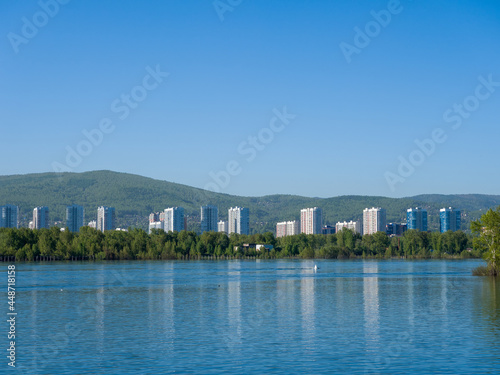 The Yenisei River. View of the city of Krasnoyarsk. Summer sunny day. Clear sky