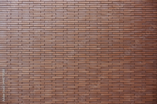 Modern red brown brick background. Brick surface for design. Design background material. Vintage, wallpaper, interior, exterior elements