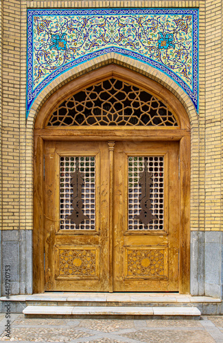 detail of the wooden door of a mosque in Iran country