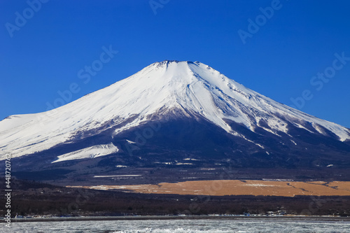 Beautiful Mount Fuji and Lake Yamanaka with Nature background and blue sky in winter., japan.