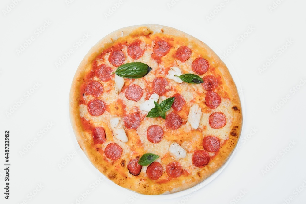 Mixed pizza from top isolated on white background clipping path included.