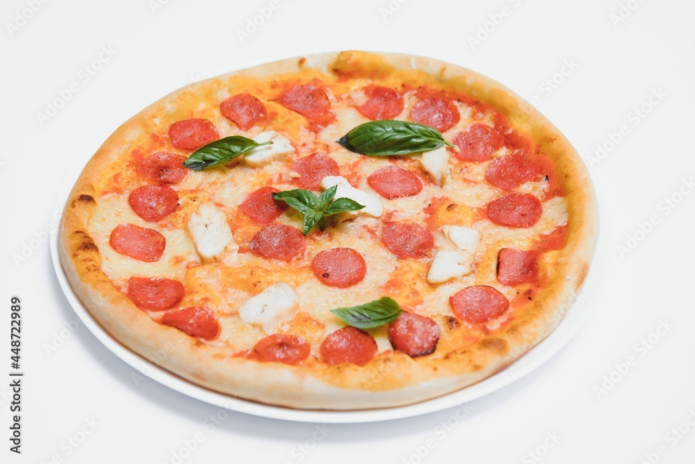 Mixed pizza from top isolated on white background clipping path included.