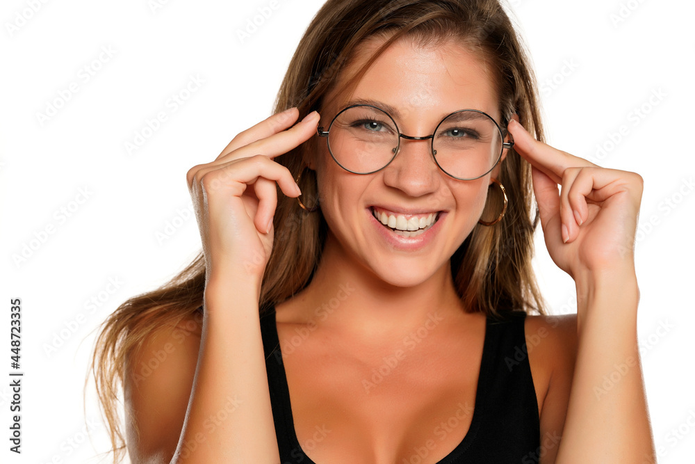 a young beautifu smiling woman with blue eyes and glasses a young beautifu smiling woman with blue eyes and glasses