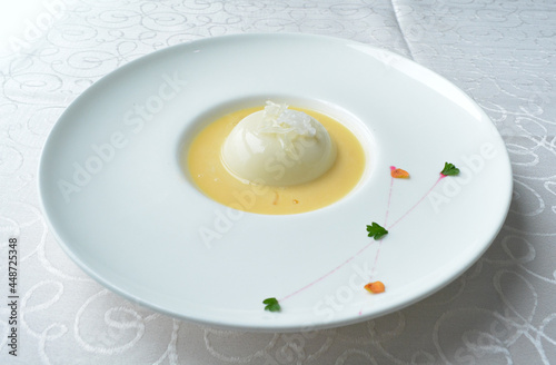 chilled mango pudding with mango puree soup dessert in white background asian halal menu