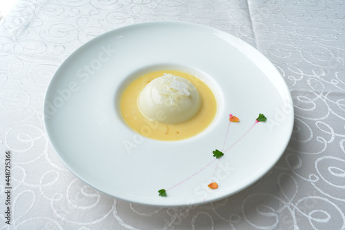 chilled mango pudding with mango puree soup dessert in white background asian halal menu