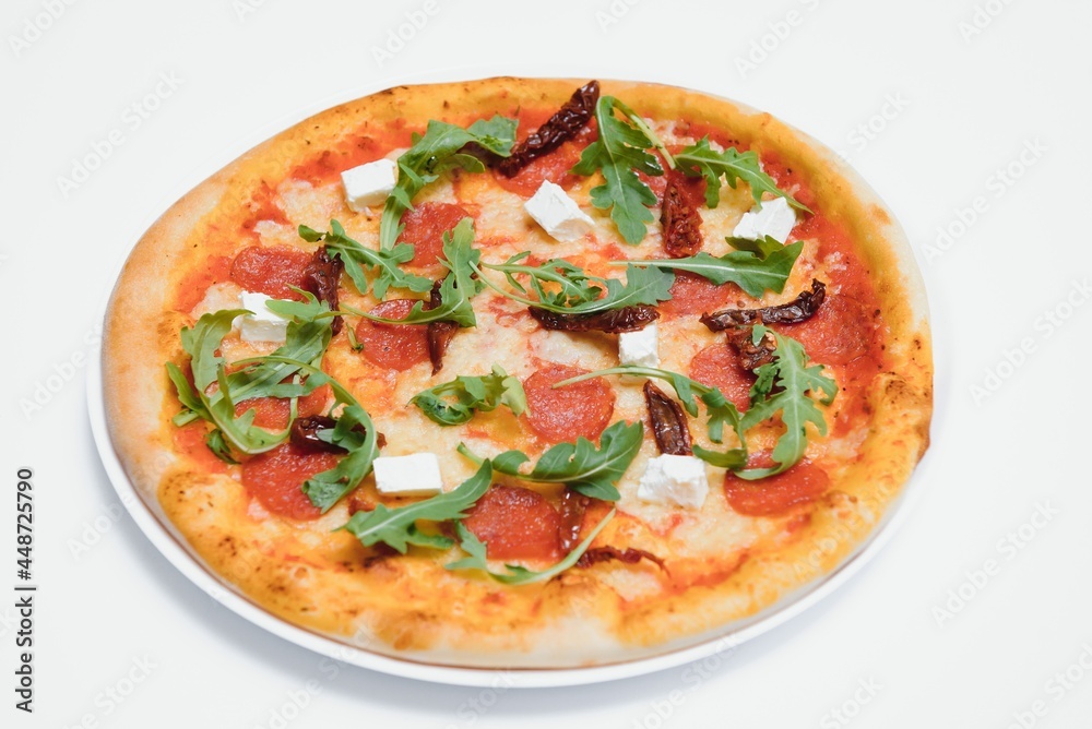 Mixed pizza from top isolated on white background clipping path included.