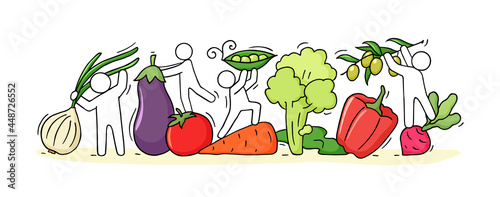 Happy people with frash vegetables.