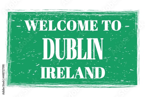 Photography WELCOME TO DUBLIN - IRELAND, words written on green stamp