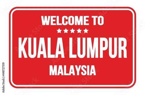 Photography WELCOME TO KUALA LUMPUR - MALAYSIA, words written on red street sign stamp