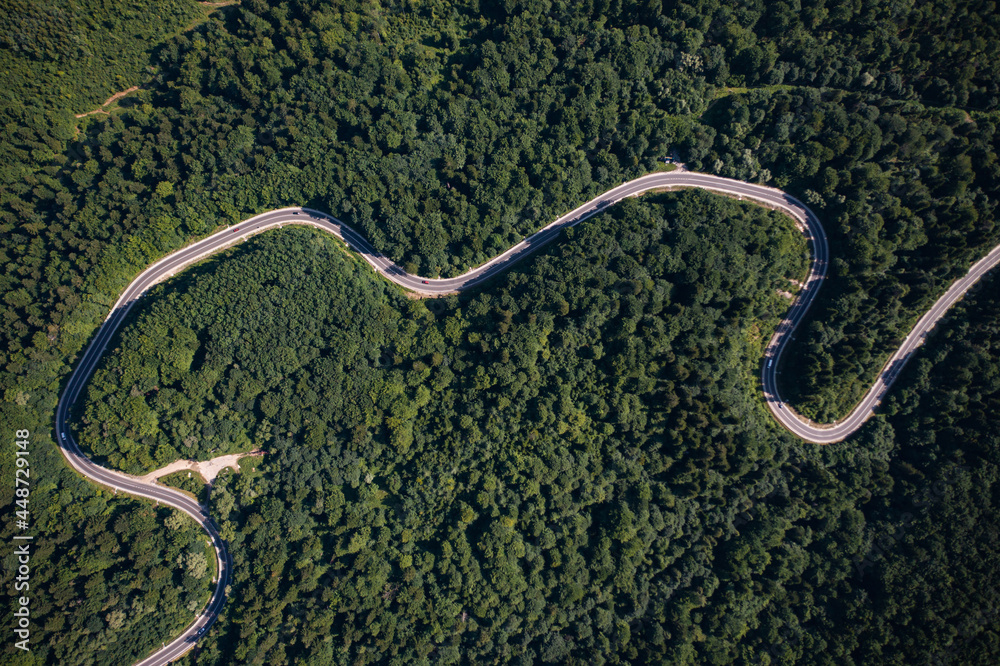 Aerial view on mountain road from drone