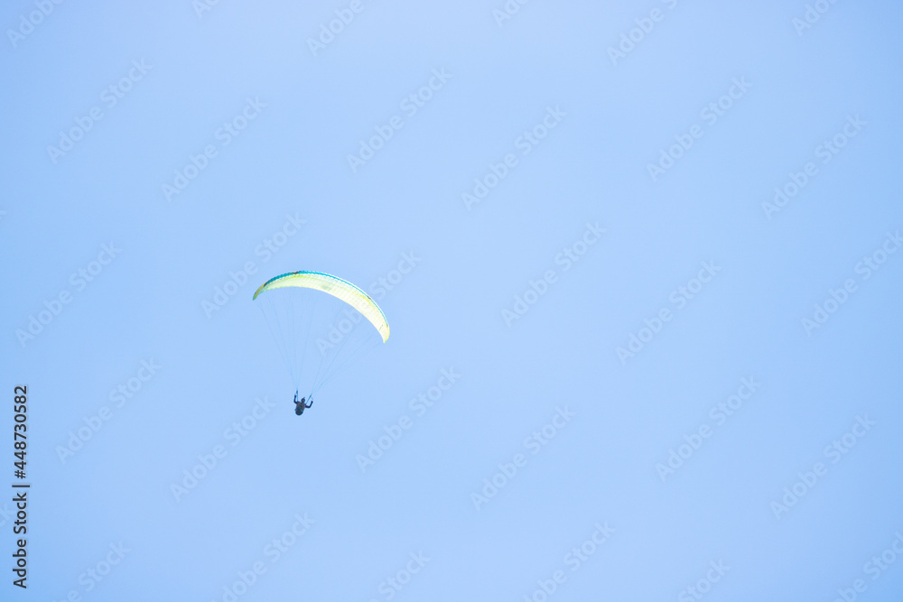 paragliding on blue sky. Copy space available on the picture paragliding on blue sky. Copy space available on the picture