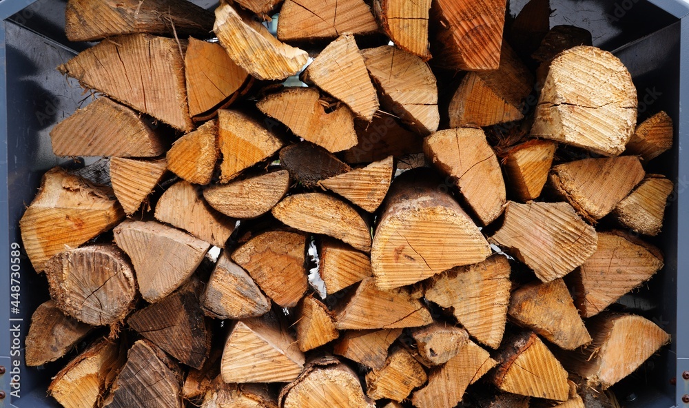 Stacks of chopped fire wood logs Stacks of chopped fire wood logs