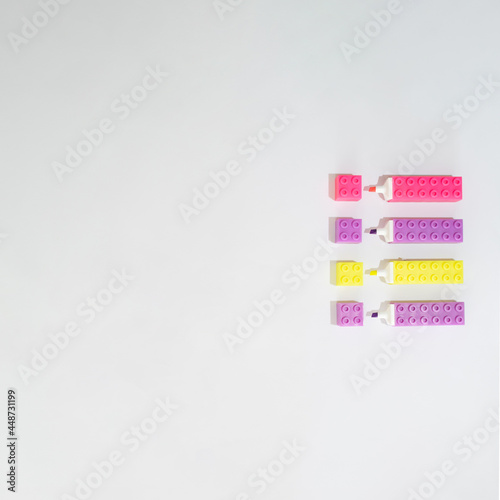 school and business supplies in vibrant colors on a white background.flat lay copy space minimal concept design