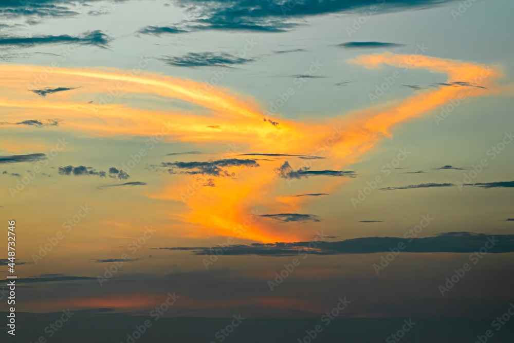 Clouds in golden light in evening