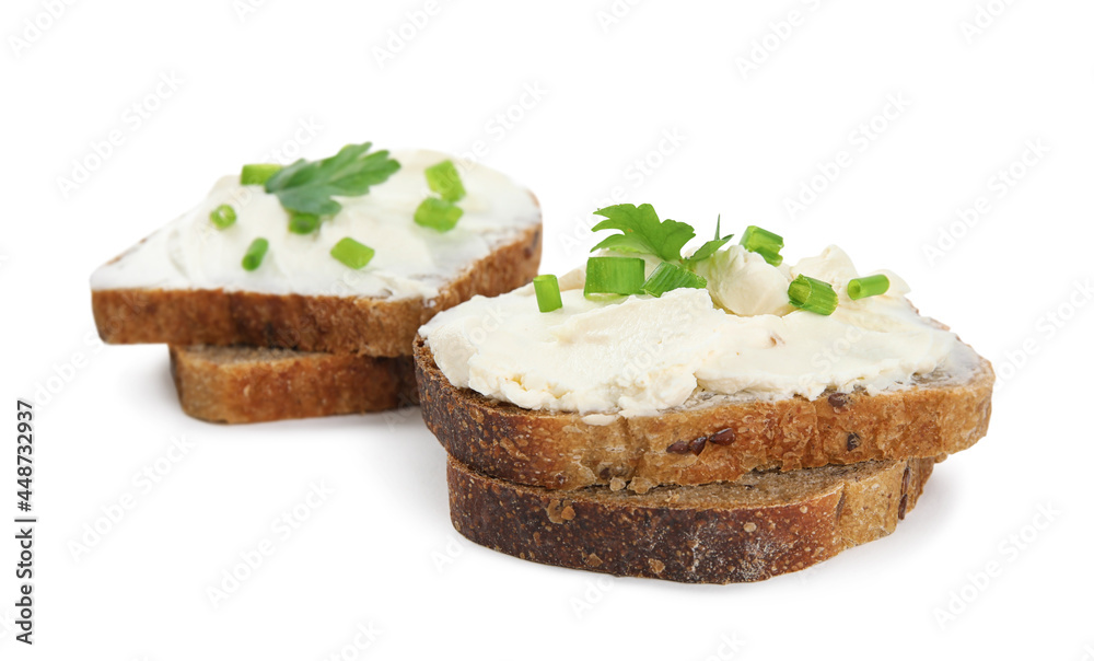 Bread with cream cheese, green onion and parsley on white background Bread with cream cheese, green onion and parsley on white background