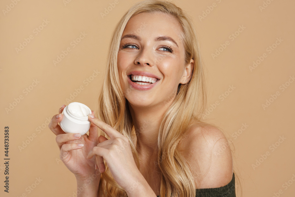Smiling young blonde woman with long hair Smiling young blonde woman with long hair