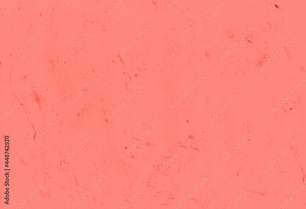 Fototapeta premium The texture of a sheet of old coral-colored paper.