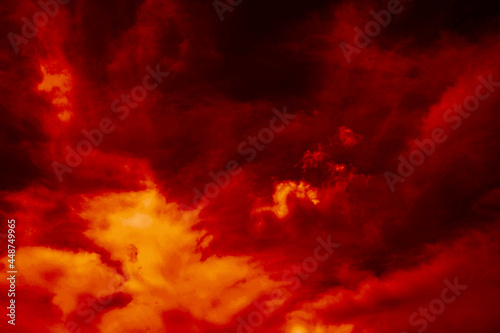 Fiery red dramatic sky. Fire, war, explosion, catastrophe, flame. Horror concept. Web banner. Bloody red background with copy space for design.