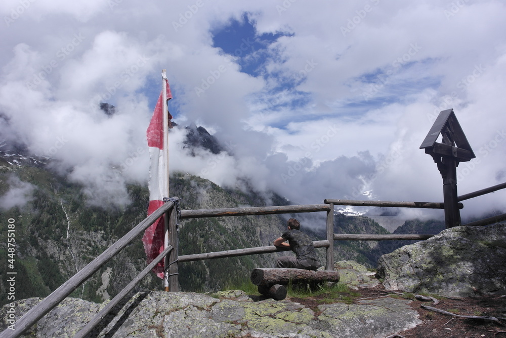 Fototapeta premium explorer of mountain alpine beauty at the level of the clouds, fresh air cloudscape - valley Mont Blanc