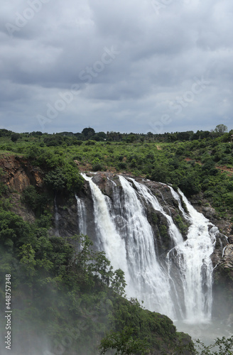 A Portrait view of the Shimsha waterfall descending from the hills majestically during monsoon in Karnataka  India.