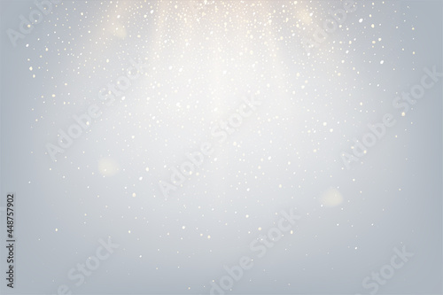 Golden glitter and sparkles in sun rays background. Yellow lines in shiny light vector illustration. Bright dust sparkling on gray wallpaper design. Christmas or holiday card decoration