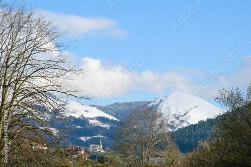 Pico de la Cruz and the snow-capped mountains of Galdames  seen from Sopuerta