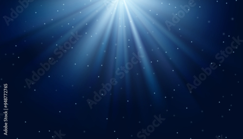 White and light blue rays on the dark blue background. Vector illustration.