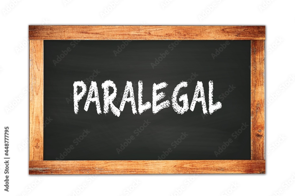 PARALEGAL text written on wooden frame school blackboard. PARALEGAL text written on wooden frame school blackboard.