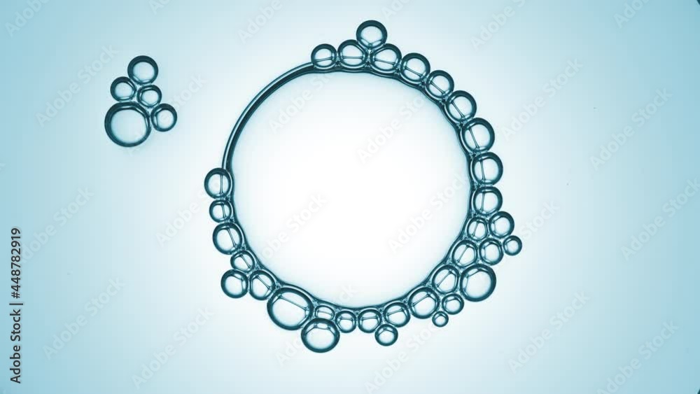 Big molecule of glycerin joined with small ones attracts bubble cluster spreading on its surface on cyan background | Skin care balm ingredients commercial Big molecule of glycerin joined with small ones attracts bubble cluster spreading on its surface on cyan background | Skin care balm ingredients commercial