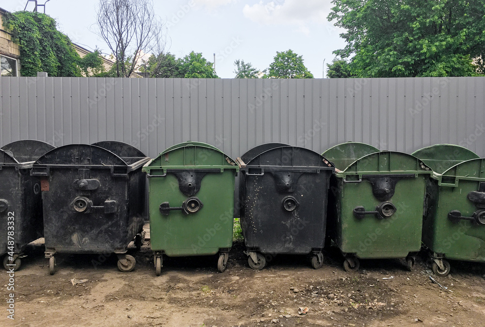 trash containers on the street. dump. waste. trash containers on the street. dump. waste.