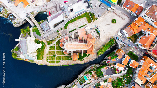 In this imagen you can see Castro Urdiales, its port, its cliff, and its buildings- All of this is ubicated in Cantabric see, in Cantabria, Spain.  photo