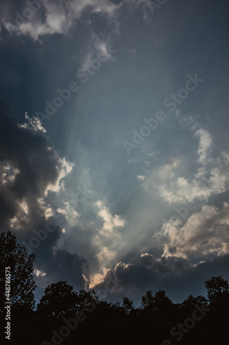 clouds and sunrays in the sky