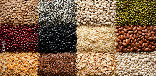 Group of dry organic cereal and grain seed in square pattern consisted of lentils, sesame, blackeye pea, red and black bean, rice, flax seed, mung bean, and pinto, in dark tone photo