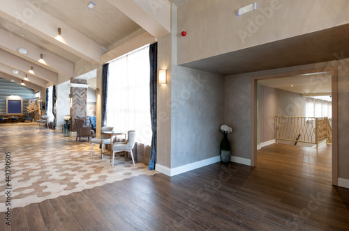 Tiled, wooden like, floor in hotel interior