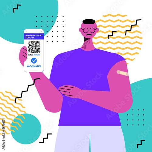 vaccinated man using digital immunity passport on smartphone screen risk free covid-19 pandemic