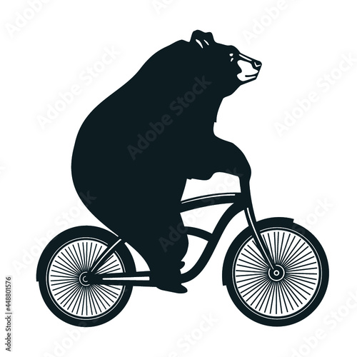 Cute bear on a bike. Vector t-shirt. Graphic design.