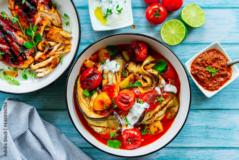 Grilled eggplant with tomatoes and bell pepper in a bowl Grilled eggplant with tomatoes and bell pepper in a bowl