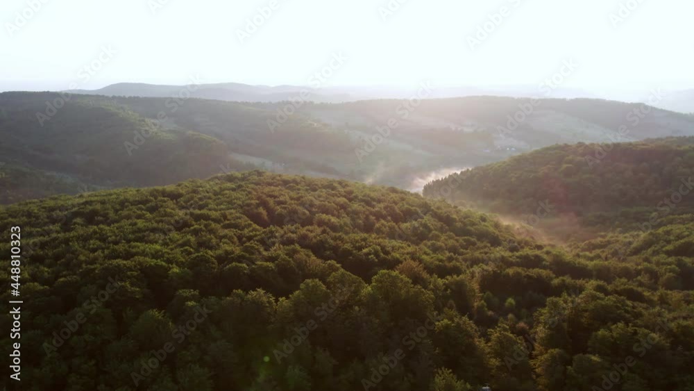 Aerial view of amazing mountain landscape with colorful vivid sunrise on sky, natural outdoor travel background. World of beauty.