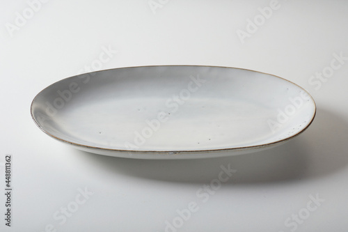 Oval shaped pate placed on white table