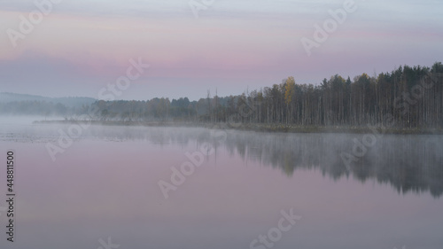 Autumn foggy morning on a lake. High quality photo © Iurii