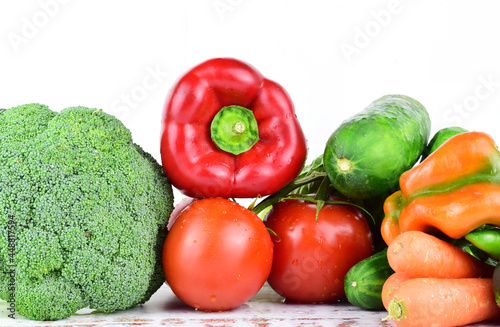 Assortment of fresh vegetables on white background, essential for good health. Copy space.