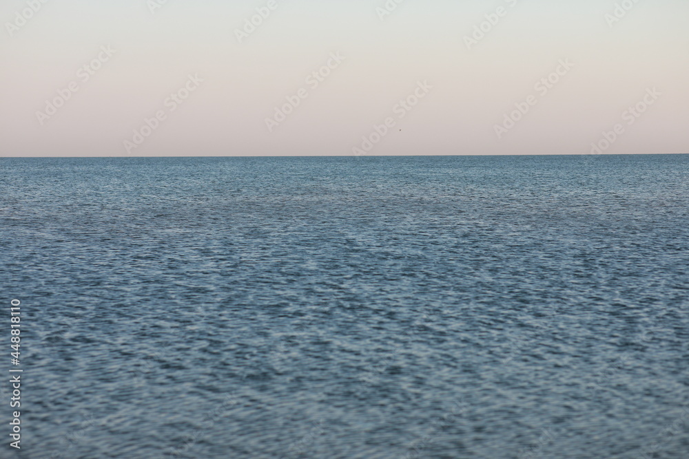 ocean close-up with transparent water on the sandy shore ocean close-up with transparent water on the sandy shore