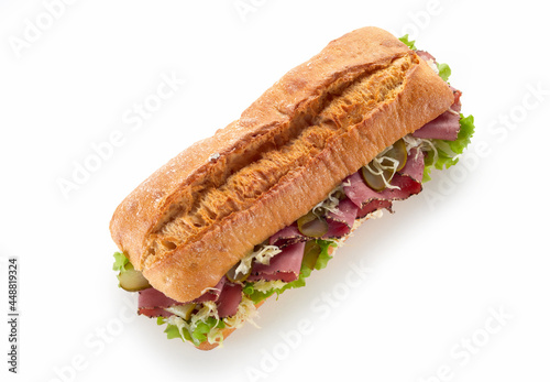 Tasty baguette sandwich on white background