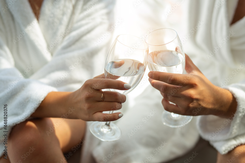 glasses of champagne in the hands of people glasses of champagne in the hands of people