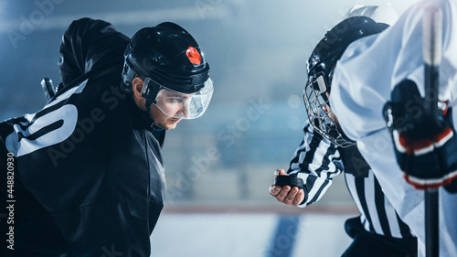 Photography Ice Hockey Rink Arena Game Start: Two Professional Players Aggressive Face off, Sticks Ready