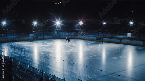 Photography Ice Hockey Rink Arena: Professional Player Training Alone