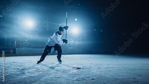 Photography Ice Hockey Rink Arena: Professional Player Shooting, Hitting, Stricking the Puck with Hockey Sticks