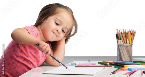 Little girl painting.