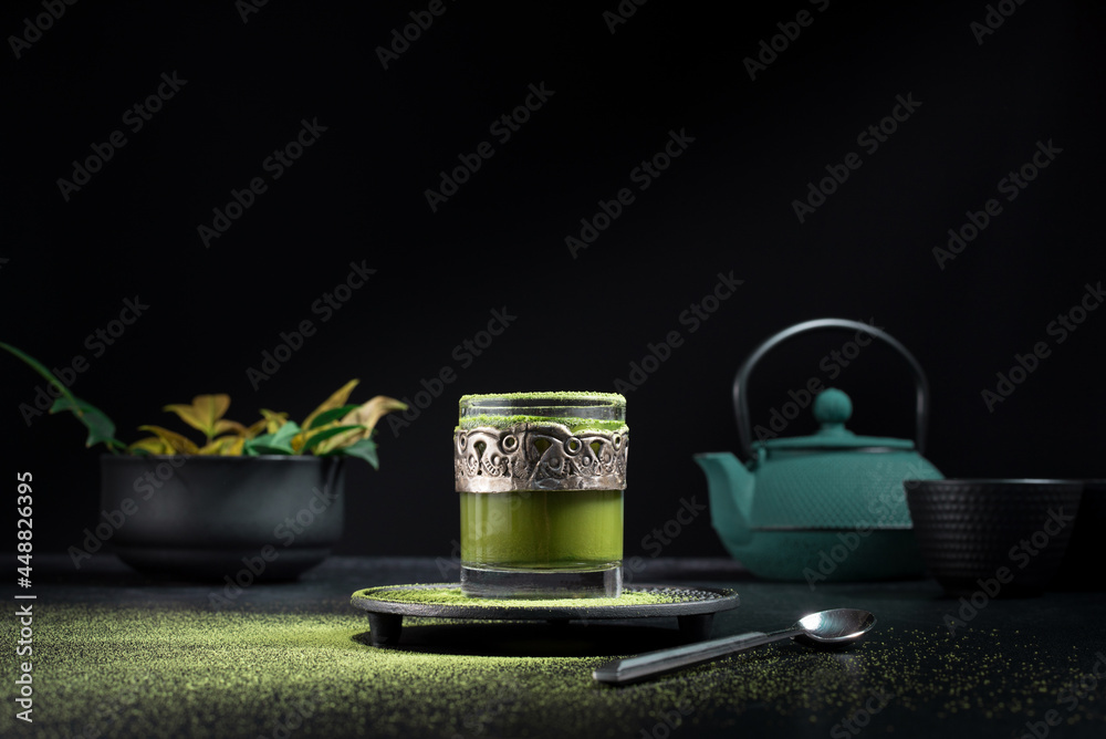 Glass with green matcha tea