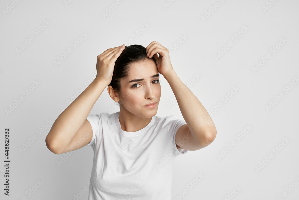 woman with headache holding her head migraine treatment health problem woman with headache holding her head migraine treatment health problem